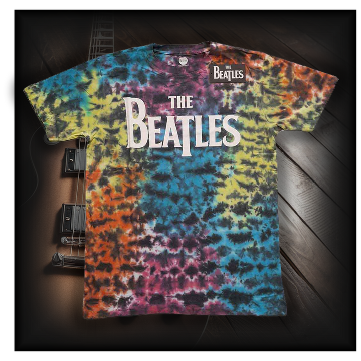 a tie dye shirt with the beatles on it